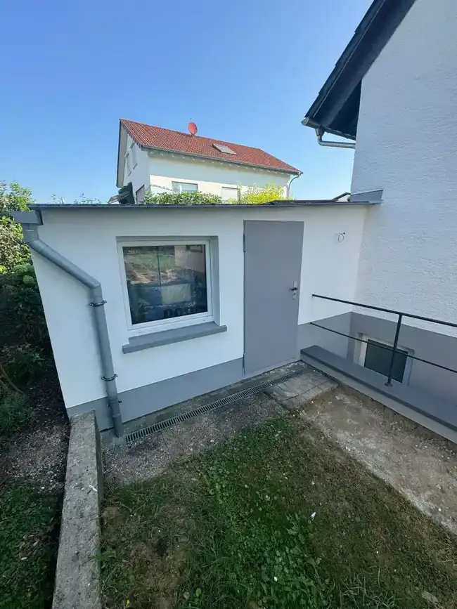 Fertiges Einfamilienhaus nach Fassadensanierung – Maler mit Stern Butzbach